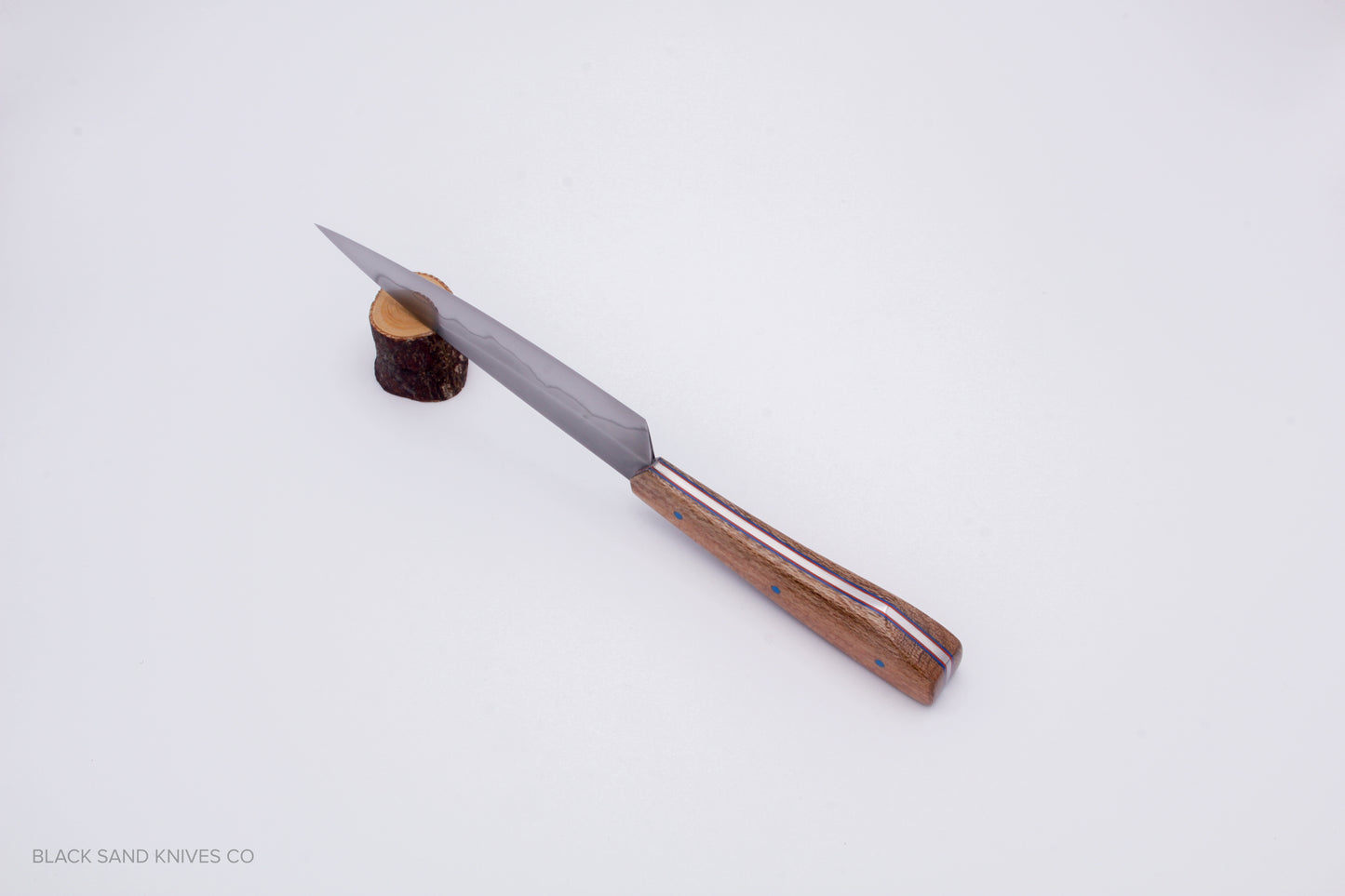 5.5" (140mm) Petty with Hamon in W2 High Carbon Steel with Macadamia Wood Handles - Blue and red liners