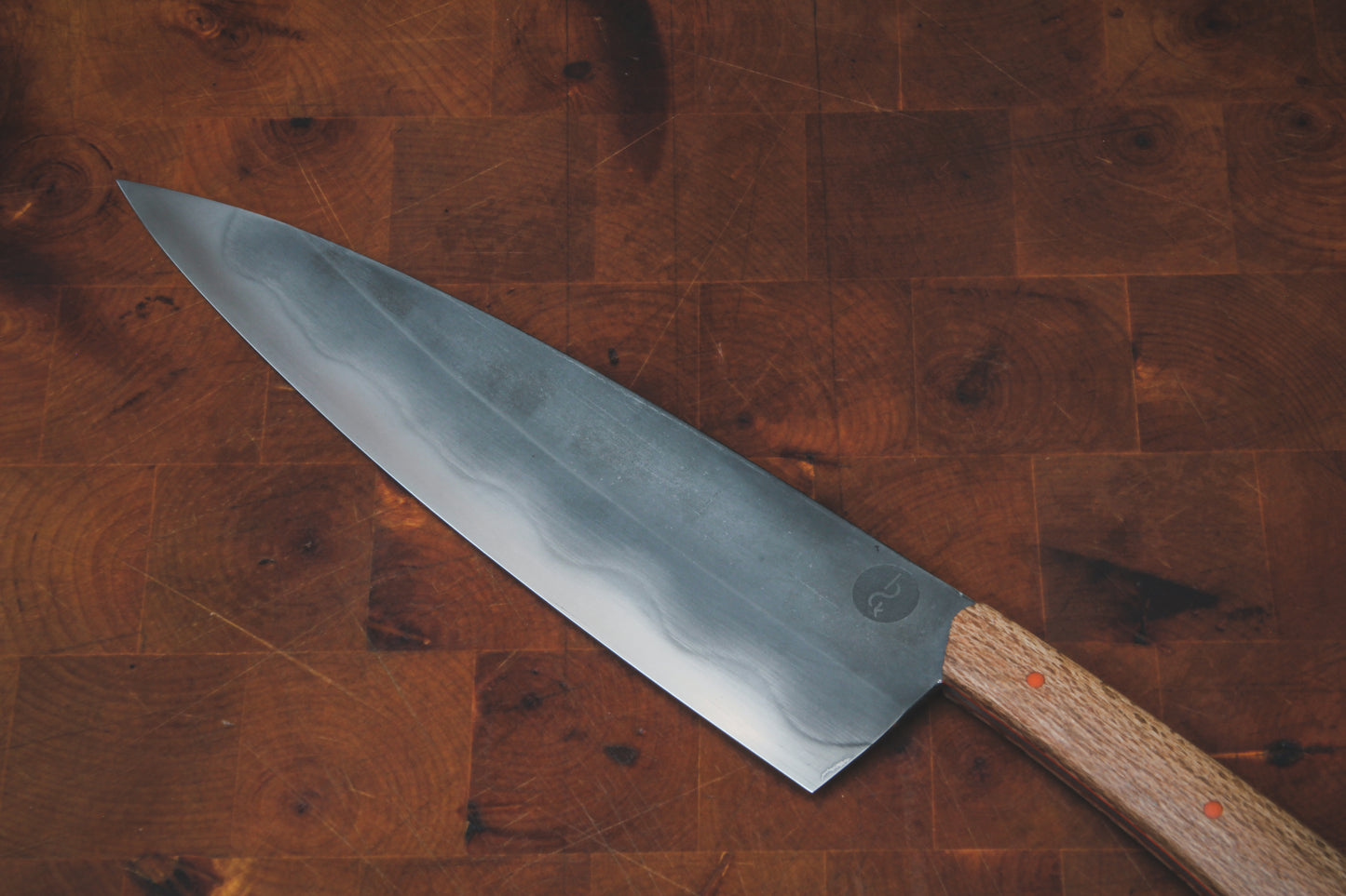 8" (200mm) Chef Knife in 1095 High Carbon Steel with Macadamia wood Handles and Orange G10 liners & pins