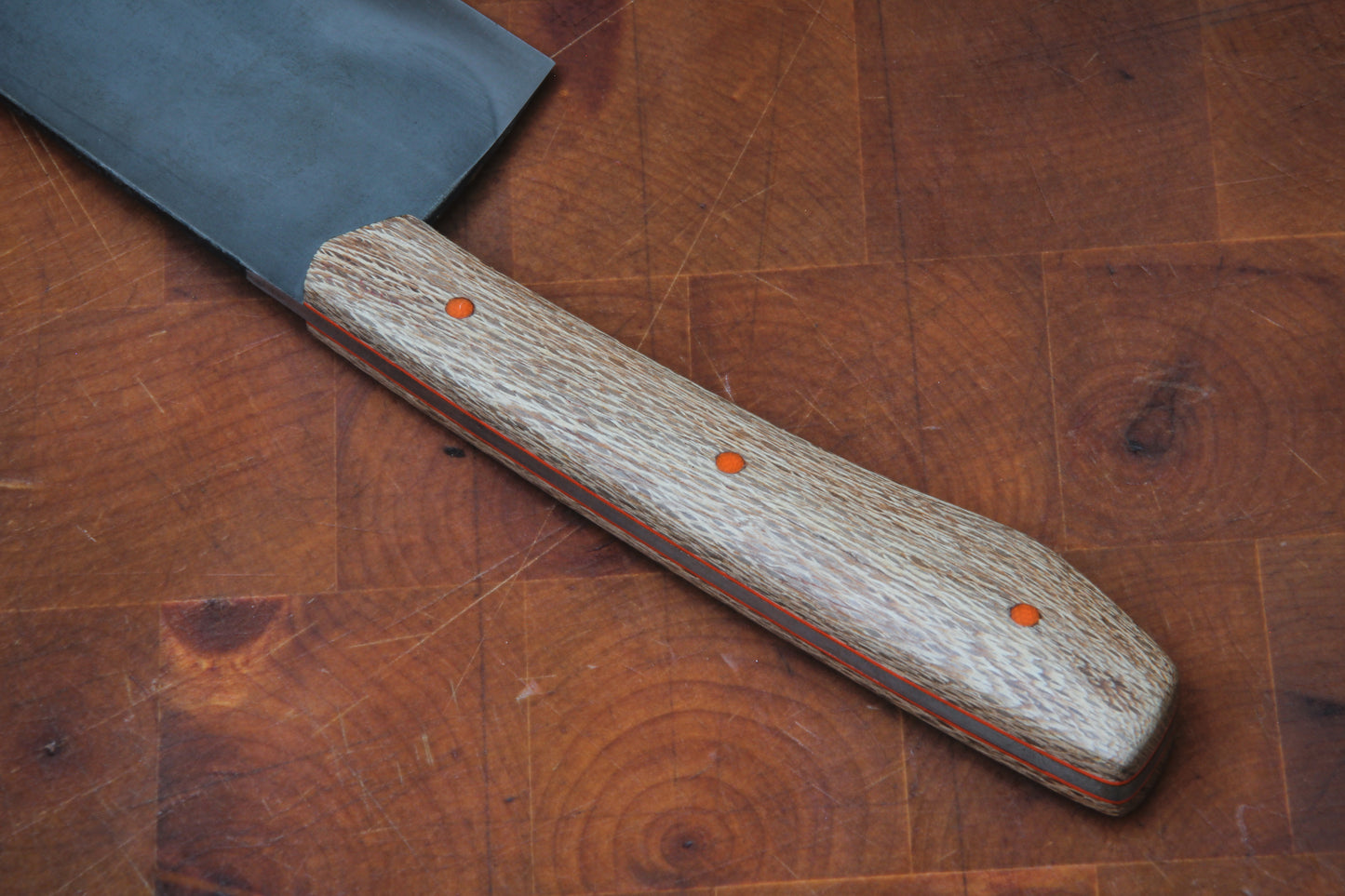 8" (200mm) Chef Knife in 1095 High Carbon Steel with Macadamia wood Handles and Orange G10 liners & pins