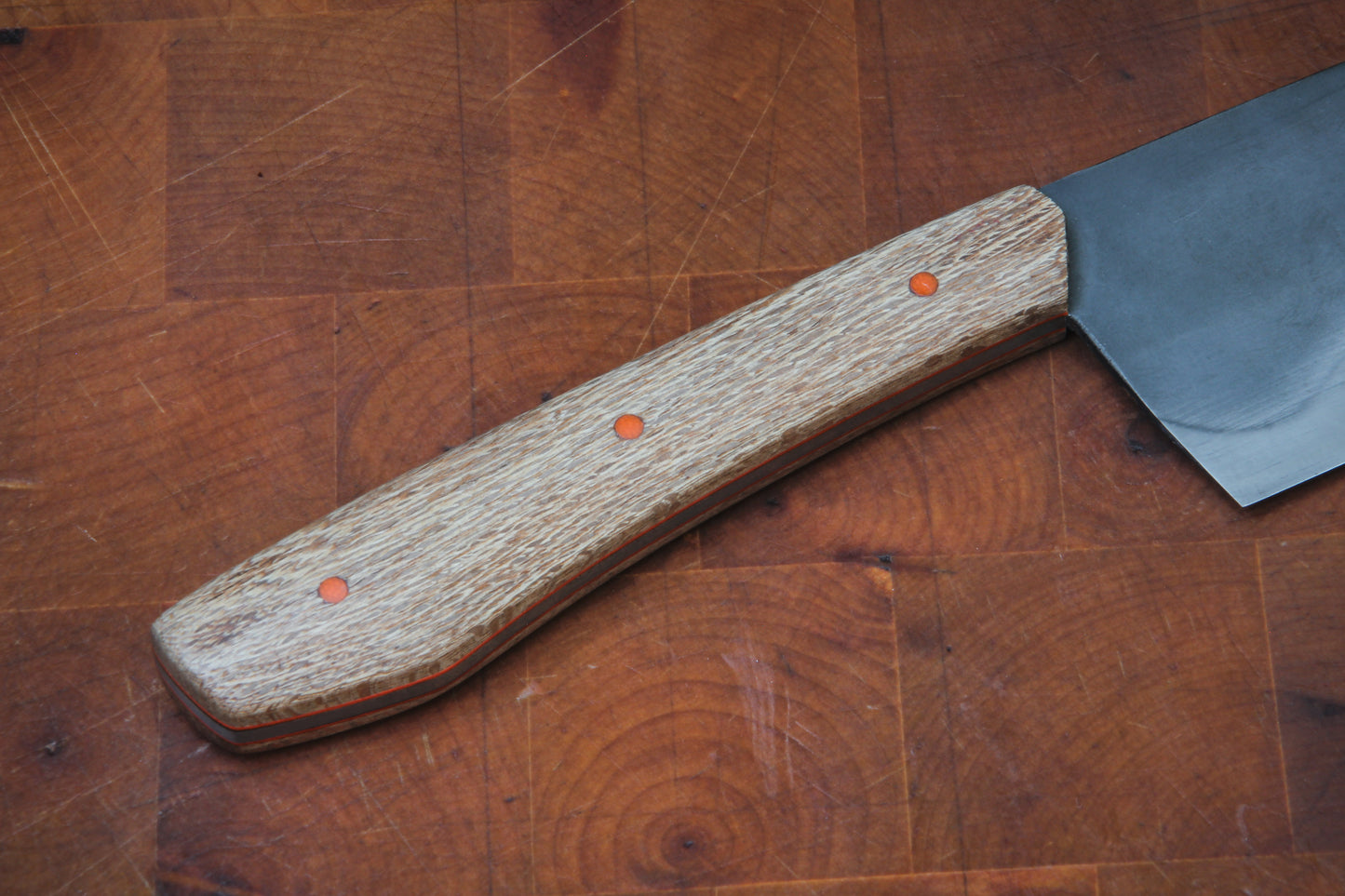 8" (200mm) Chef Knife in 1095 High Carbon Steel with Macadamia wood Handles and Orange G10 liners & pins