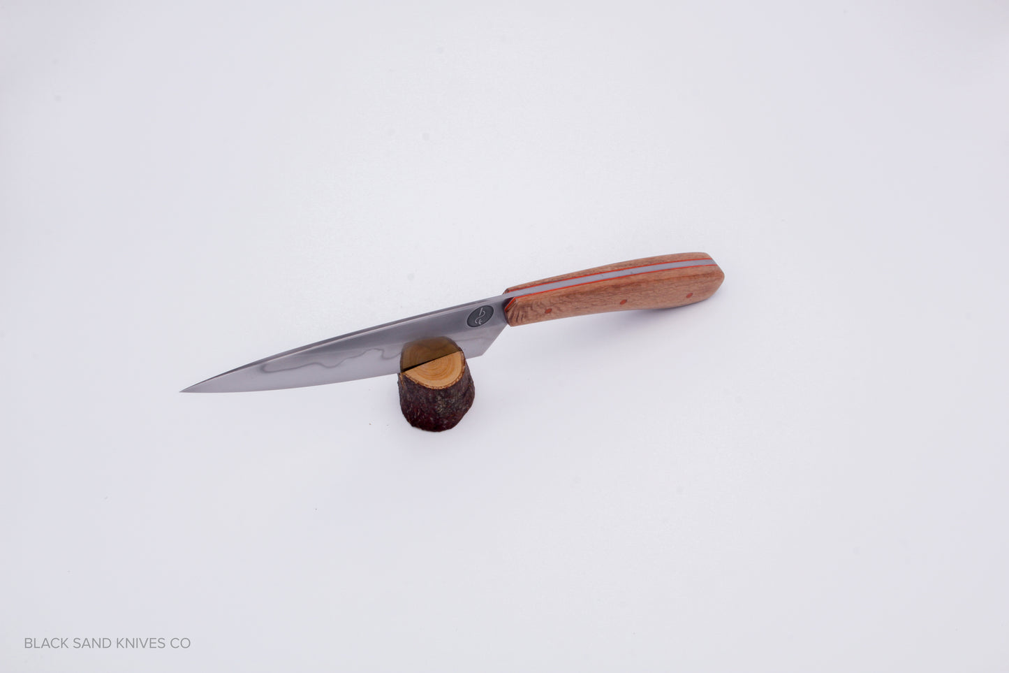 5.5" (140mm) Petty with Hamon in W2 High Carbon Steel with Macadamia Wood Handles in Red & Gray G10 Liners