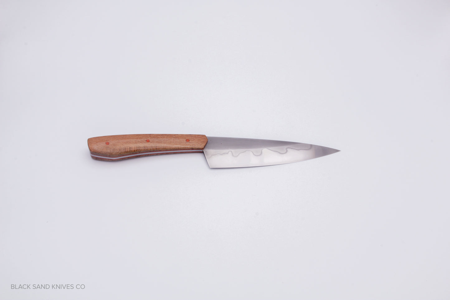 5.5" (140mm) Petty with Hamon in W2 High Carbon Steel with Macadamia Wood Handles in Red & Gray G10 Liners