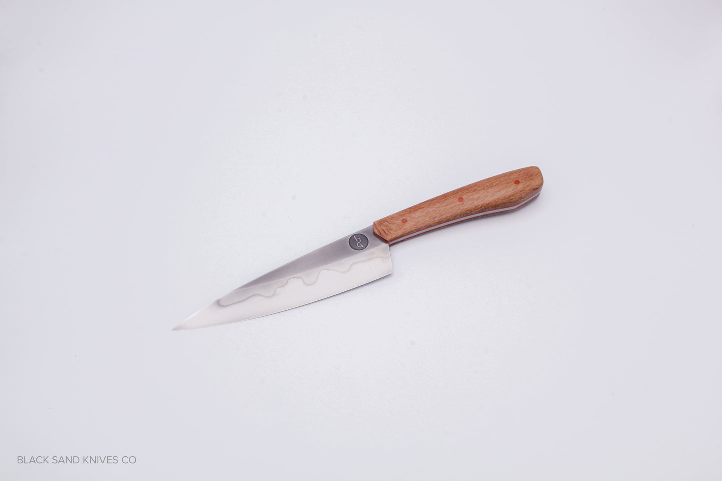 5.5" (140mm) Petty with Hamon in W2 High Carbon Steel with Macadamia Wood Handles in Red & Gray G10 Liners